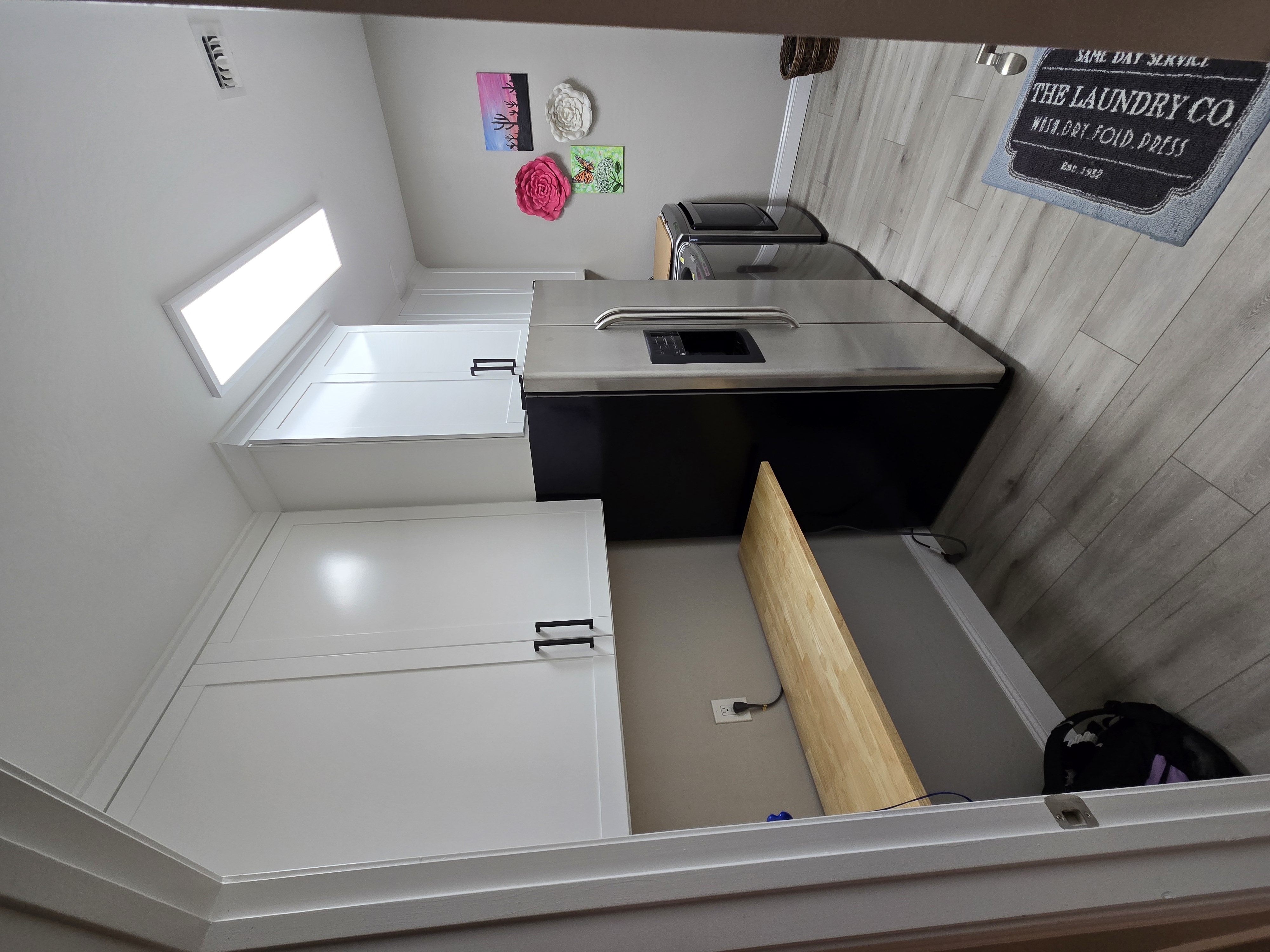 Laundry room with fold down counter
